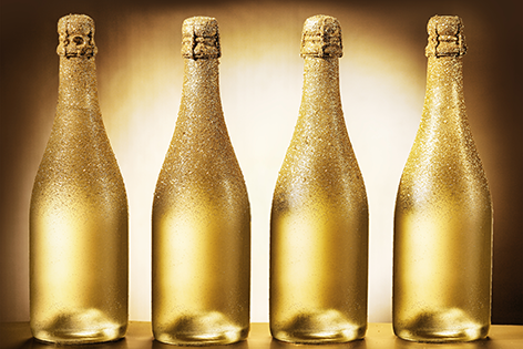 Bottles of luxury golden champagne Flessen Goud